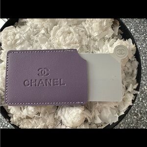 Chanel Beauty Purple mirror with protective cover